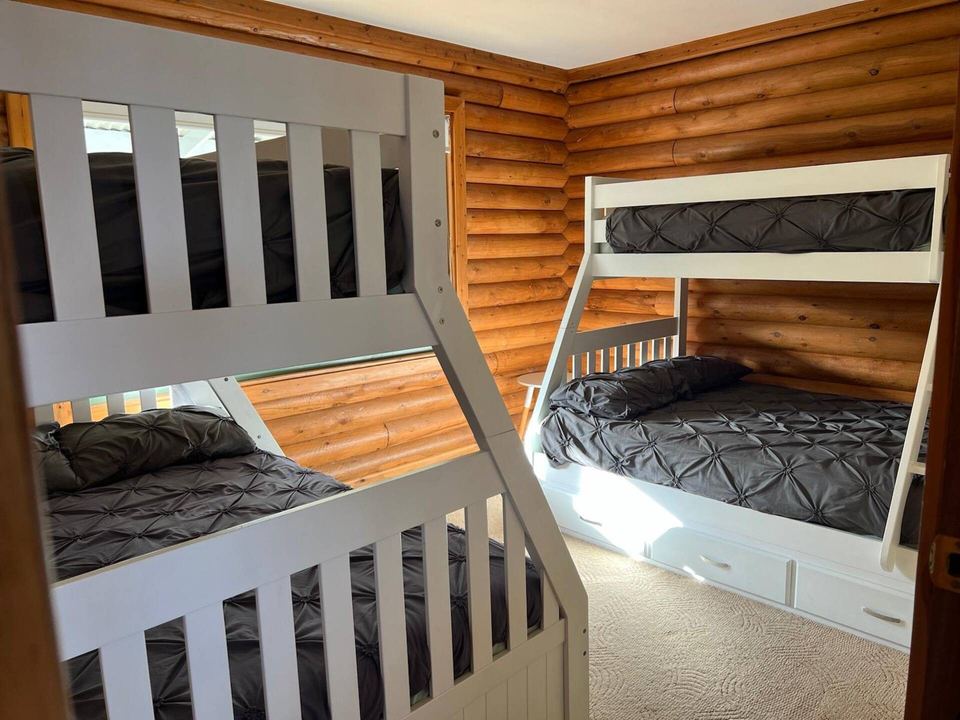 Bunk room with two sets of bunks