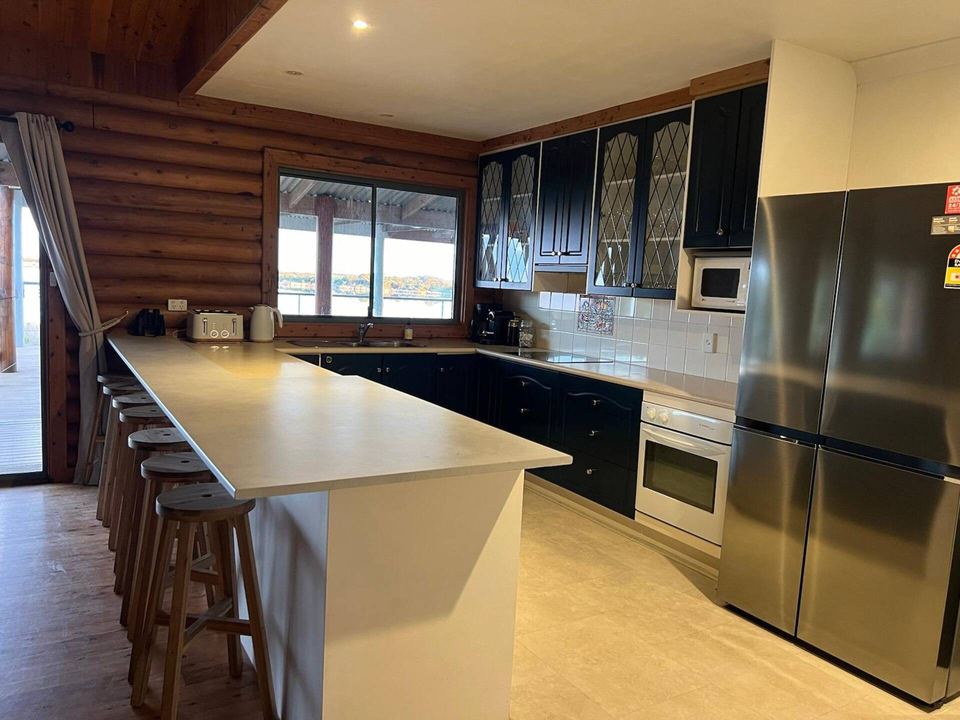 Kitchen with island bench in the lake house